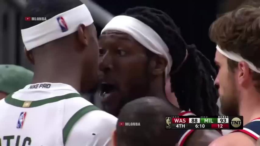 Giannis gets absolutely hacked by Montrezl Harrell and Bobby Portis immediately gets in Trezs face