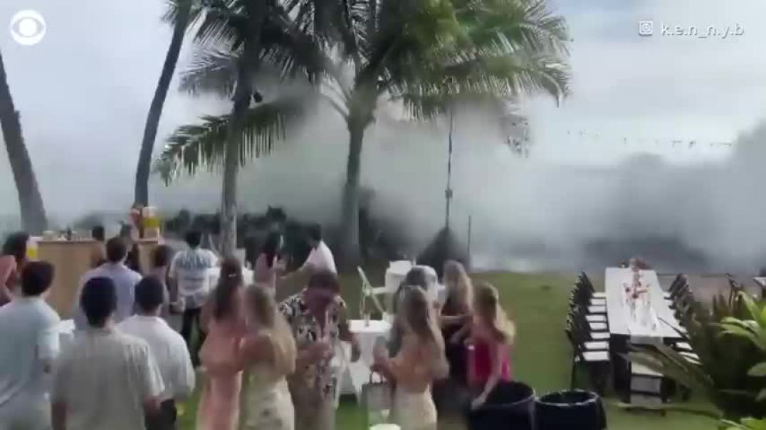 Big wave crashes wedding reception in Hawaii