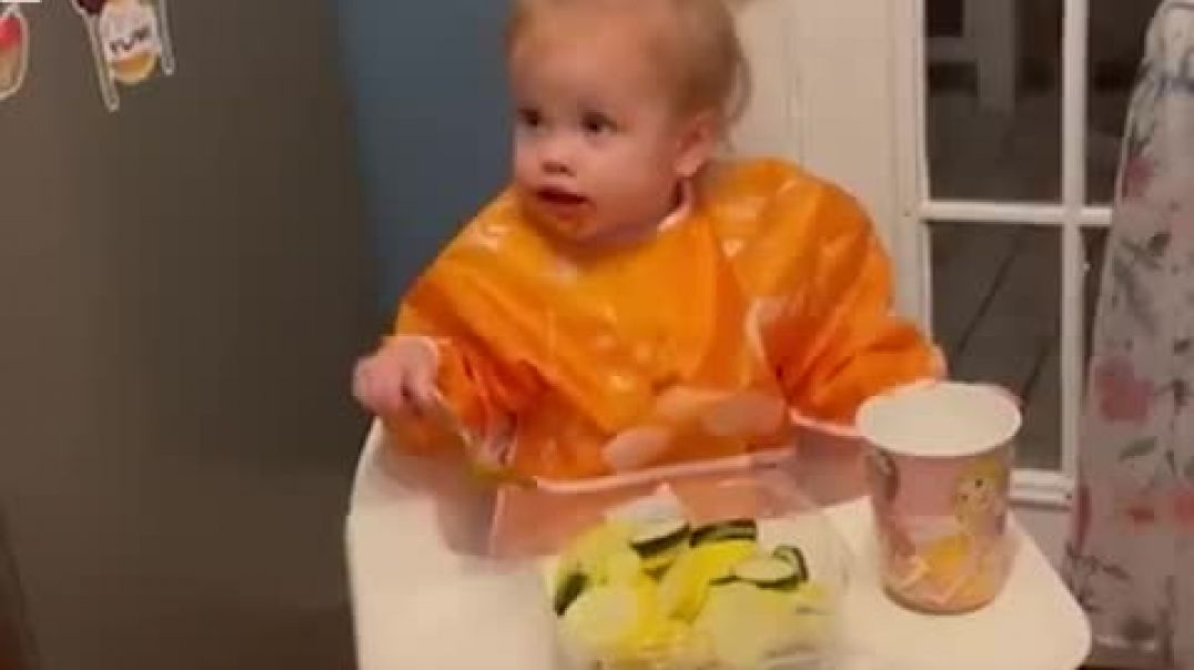 ⁣Baby has hilarious reaction after dad swaps her food l GMA