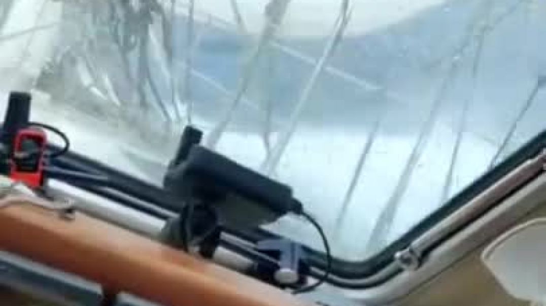 What happens during a storm on a sailboat