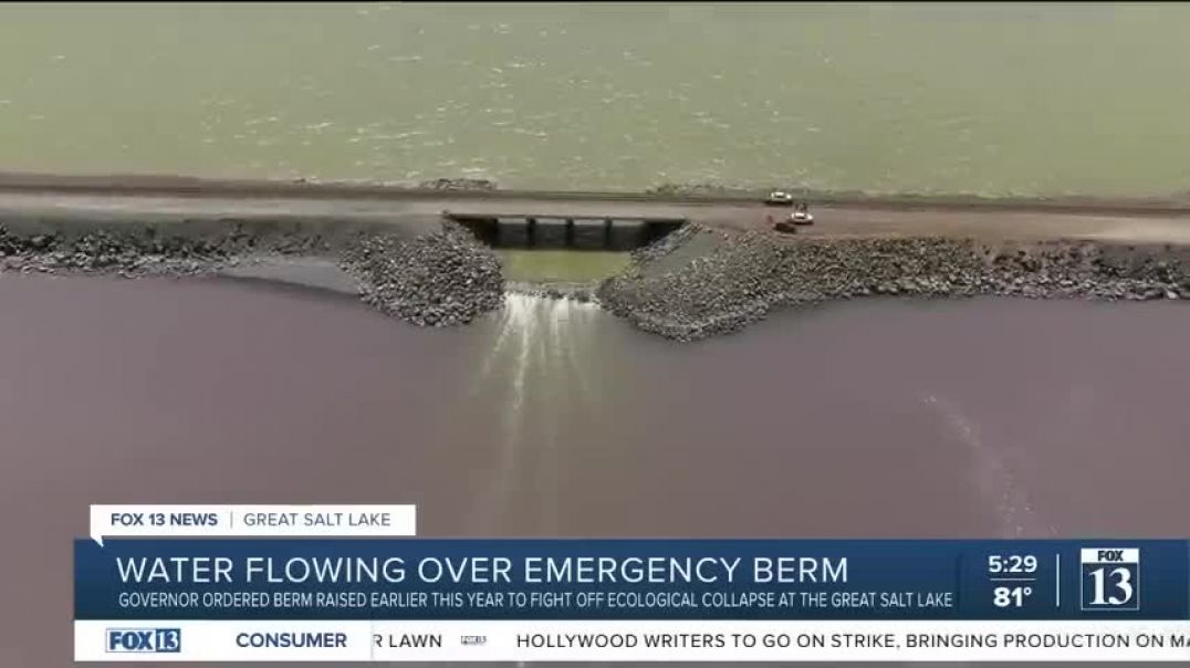⁣Water now spilling over emergency causeway berm in the Great Salt Lake