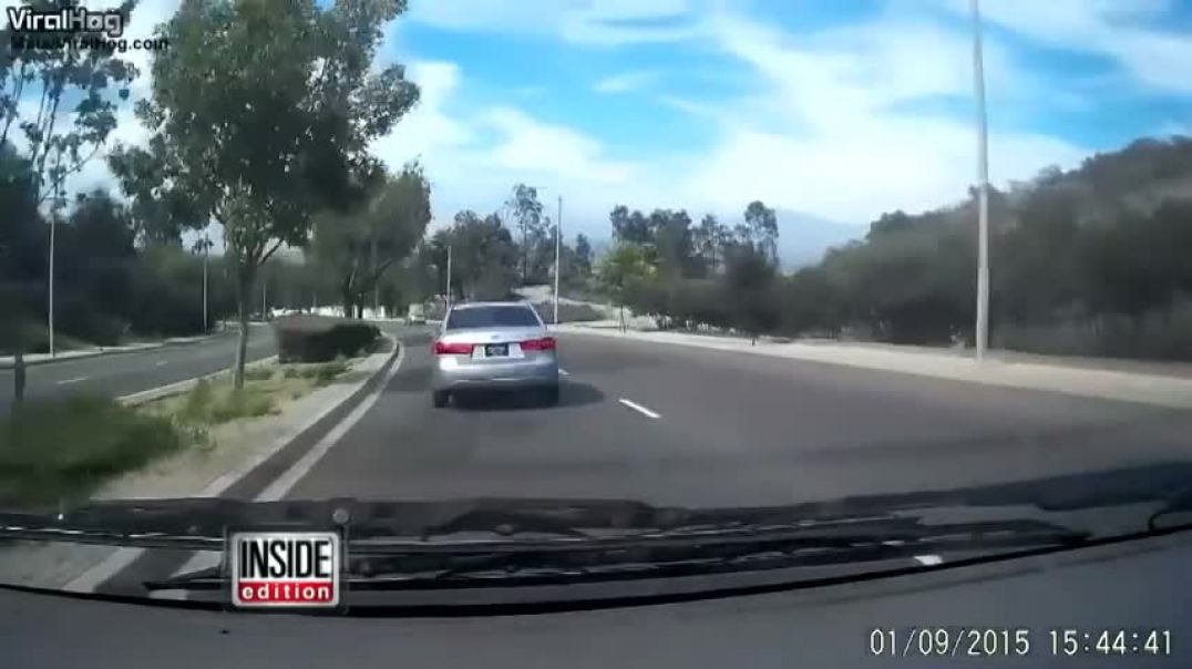 ⁣Watch The Bizarre Moment a Woman Walks Out of Her Moving Car