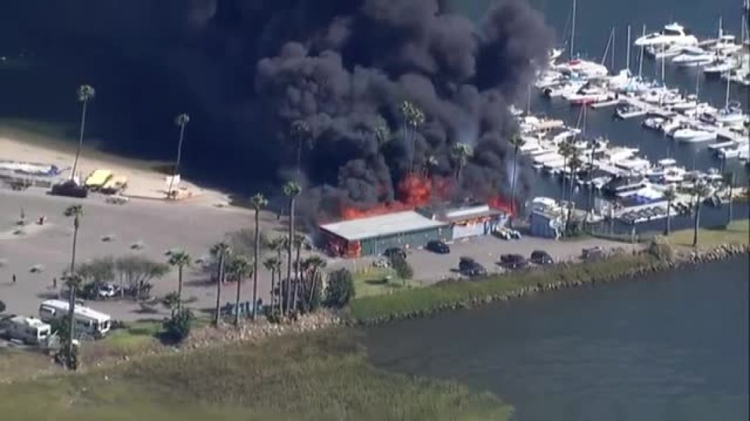 Firefighters battle structure fire burning near Campland on the Bay in Pacific Beach