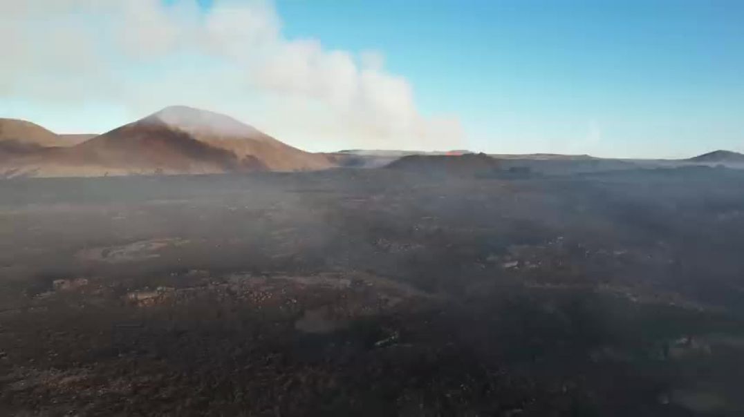 Drone approaches the boiling volcano and zooms into the lava pot! Iceland 17