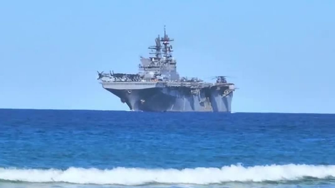 Another beautiful day in paradise, USA war ship passes Caloundra Beach