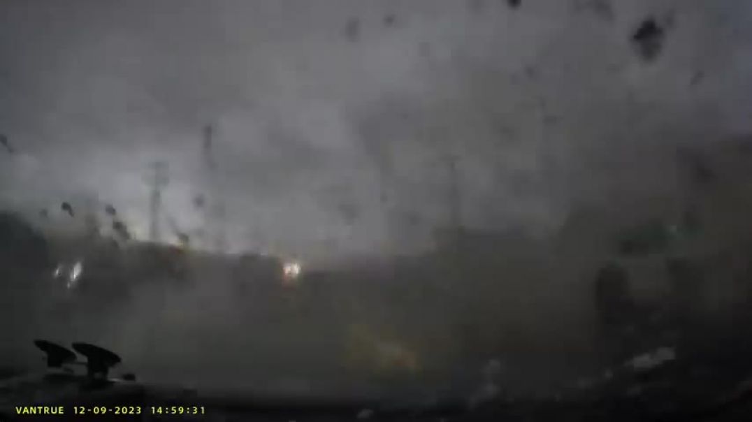⁣Shocking video shows the moment a car gets totaled by deadly Tennessee tornado