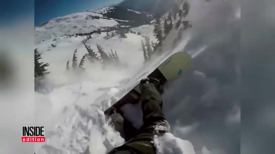 ⁣Avalanche Airbag Saves Snowboarder's Life As He's Dragged Down Mountain