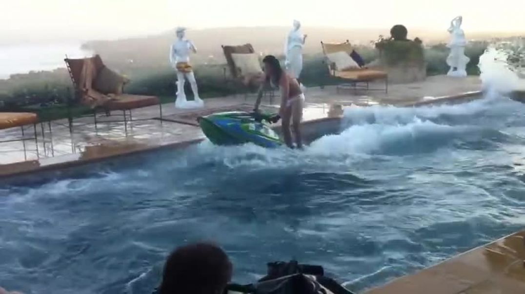 ⁣Amazing Jet Ski flips in a swimming pool!
