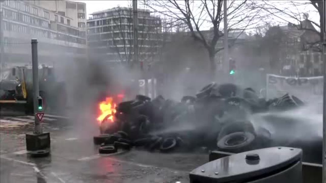 ⁣European farmers protests turn fiery in Brussels   REUTERS