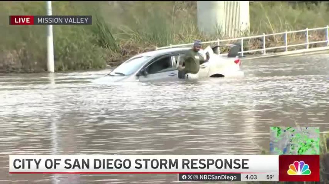 ⁣Man casually exits car after driving into flooded area of San Diego during live shot   NBC San Diego