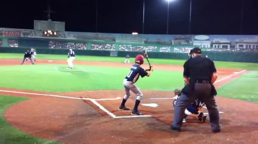 ⁣12 year old Catcher celebrates a strikeout and a win